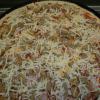 Grizzly Bear-(5 meat) 
Canadian bacon, pepperoni, Italian Sausage, crispy bacon & ground beef