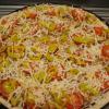 Lumberjack- 
*BBQ sauce, BBQ chicken, red onions, banana pepper rings, crispy bacon, Roma tomatoes & pineapple