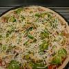 Mighty Oak- 
Pepperoni, Italian sausage, mushrooms, onion medley & green peppers