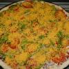 Sunset-  
crispy bacon, Italian sausage, onion medley, green peppers, Roma tomatoes & cheddar cheese
