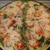 Grand Teton- 
Garlic chicken, red onions, fresh spinach, minced garlic, Roma tomatoes, fresh rosemary & asiago cheese